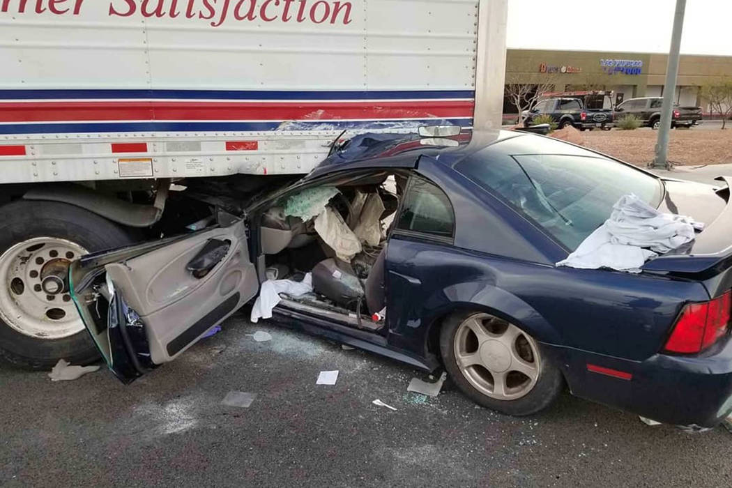 Las Vegas police investigate a crash on Las Vegas Boulevard South near Robindale Road, Tuesday, March 5, 2019. Two people were injured and taken to a hospital. (@LVMPD_Traffic/Twitter))