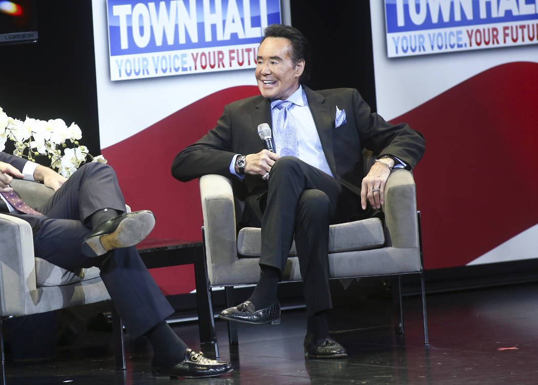 Entertainer Wayne Newton speaks with television personality Eric Bolling during a town hall about opioid addiction at the Westgate Theater in Las Vegas on Tuesday, March 5, 2019. (Chase Stevens/La ...