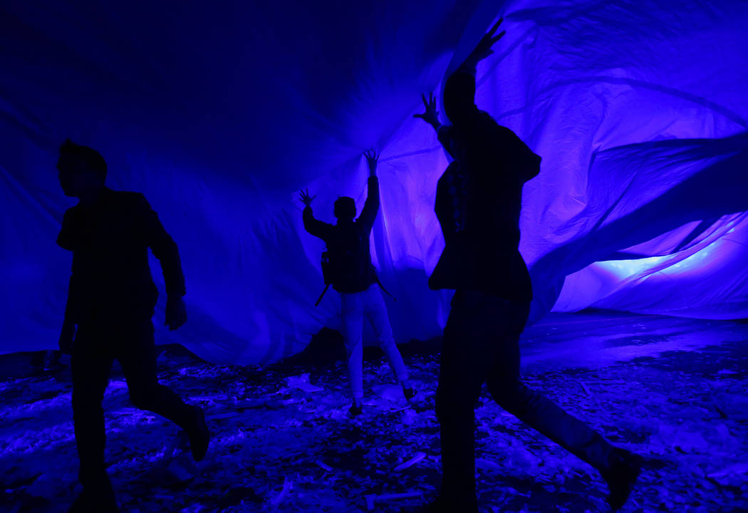 Cast members in "Fuerza Bruta" perform as part of a media preview at the show's tent outside of the Excalibur in Las Vegas on Wednesday, March 6, 2019. The show, which takes place inside ...