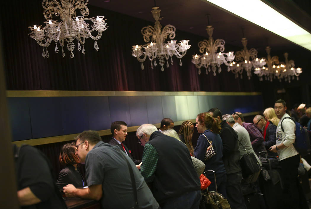 Resort guests are assisted while checking in at The Cosmopolitan of Las Vegas on Thursday, March 7, 2019. (Chase Stevens/Las Vegas Review-Journal) @csstevensphoto