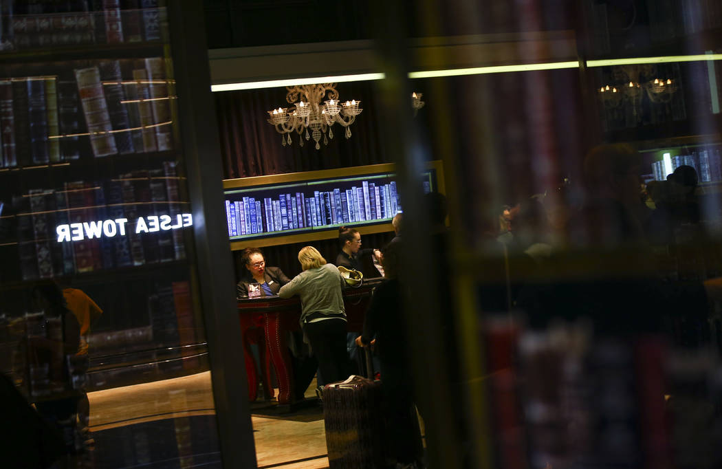 Resort guests are assisted while checking in at The Cosmopolitan of Las Vegas on Thursday, March 7, 2019. (Chase Stevens/Las Vegas Review-Journal) @csstevensphoto