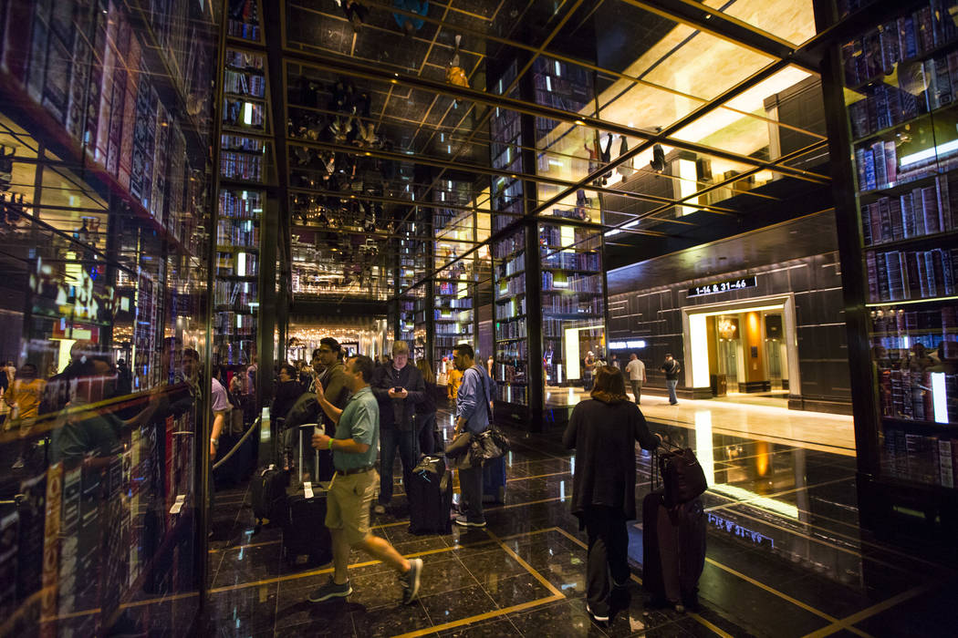 Resort guests wait in line to check-in at the main lobby of The Cosmopolitan of Las Vegas on Thursday, March 7, 2019. (Chase Stevens/Las Vegas Review-Journal) @csstevensphoto