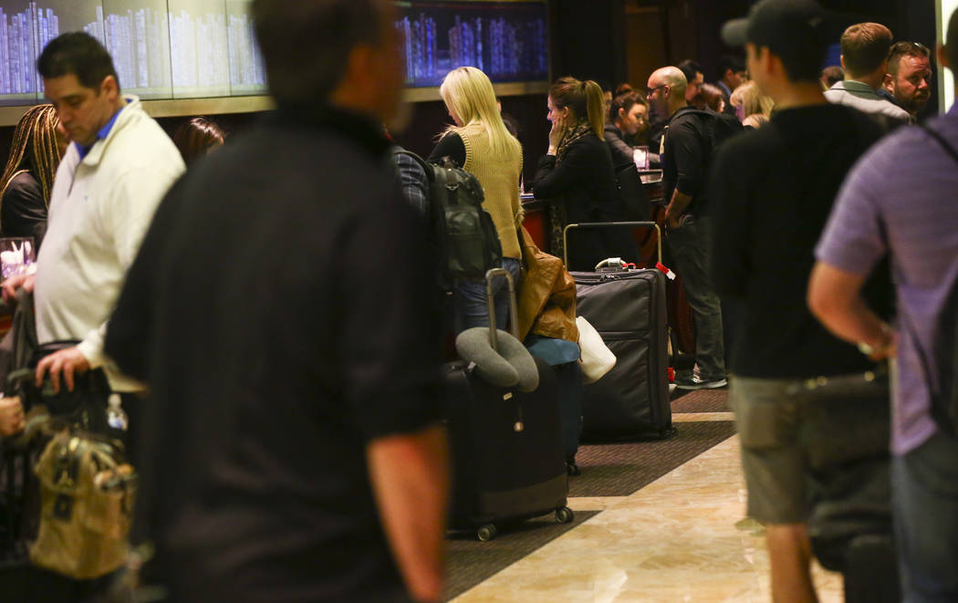 Resort guests are assisted while checking in at The Cosmopolitan of Las Vegas on Thursday, March 7, 2019. (Chase Stevens/Las Vegas Review-Journal) @csstevensphoto
