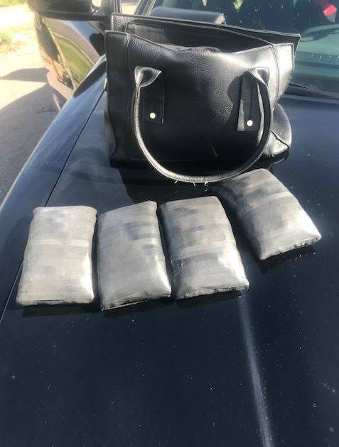 Four bundles of suspected fentanyl pills are shown Monday, March 4, 2019, during a traffic stop outside Eloy, Arizona. (Pinal County Sheriff’s Office/Facebook)