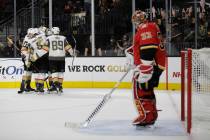 The Vegas Golden Knights celebrate after right wing Alex Tuch (89) scored a goal against the Calgary Flames during the second period of an NHL hockey game Friday, Nov. 23, 2018, in Las Vegas. (Joe ...