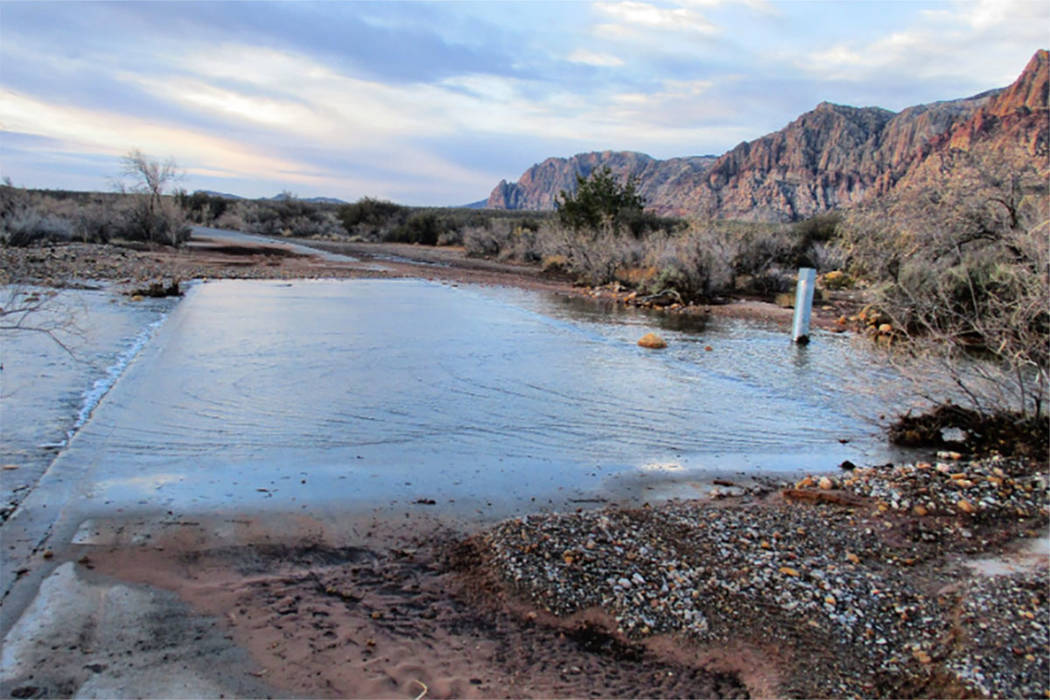 Flooding from Wednesday's rain closes the scenic loop at Red Rock Canyon National Conservation Area near Las Vegas. (Red Rock Canyon via Twitter)