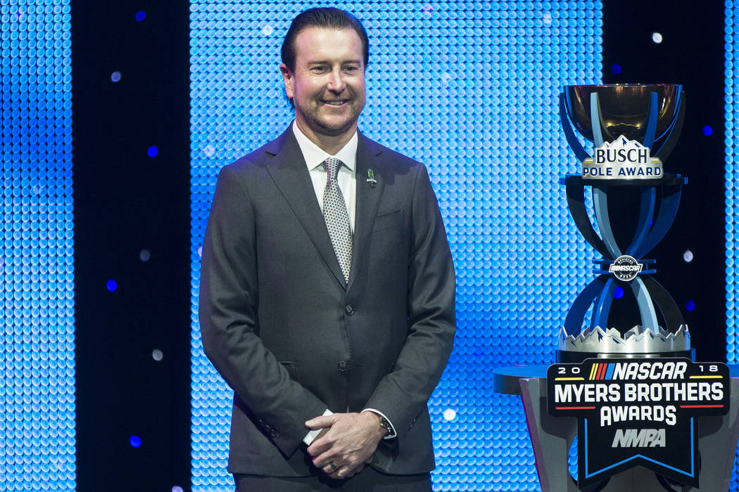 Kurt Busch takes photos after receiving the Pole Award at the NASCAR NMPA Myers Brothers Awards at Encore Theater on Wednesday, Nov. 28, 2018, at Wynn Las Vegas, in Las Vegas. Benjamin Hager Las V ...
