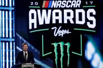 Dale Earnhardt Jr. speaks during the NASCAR Cup Series auto racing awards Thursday, Nov. 30, 2017, in Las Vegas. (AP Photo/Isaac Brekken)