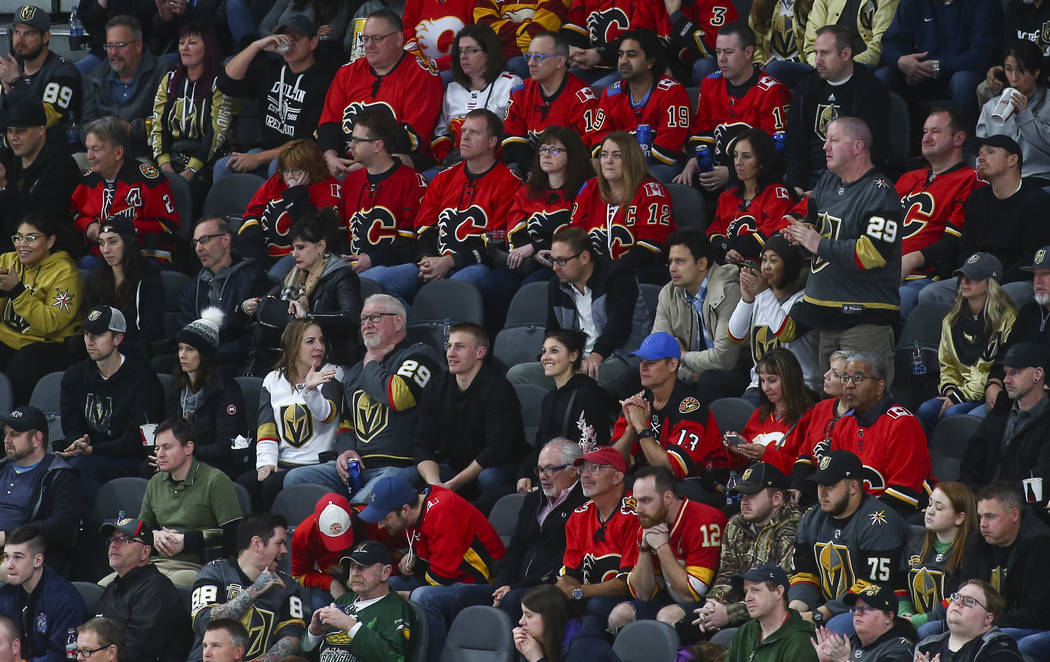 Calgary Flames fans react during the third period of an NHL hockey game against the Golden Knights at T-Mobile Arena in Las Vegas on Wednesday, March 6, 2019. (Chase Stevens/Las Vegas Review-Journ ...