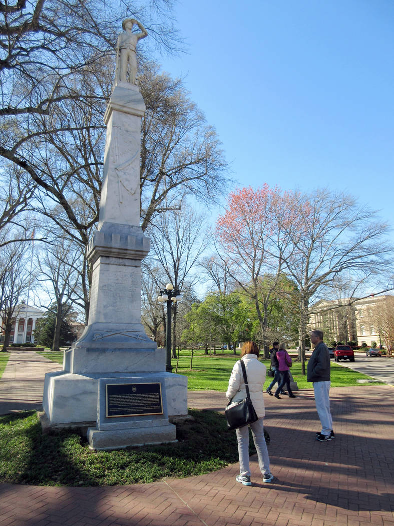 This March 12, 2017, file photo shows a statue of a Confederate soldier on the campus of the University of Mississippi in Oxford, Miss. University of Mississippi student government groups are call ...