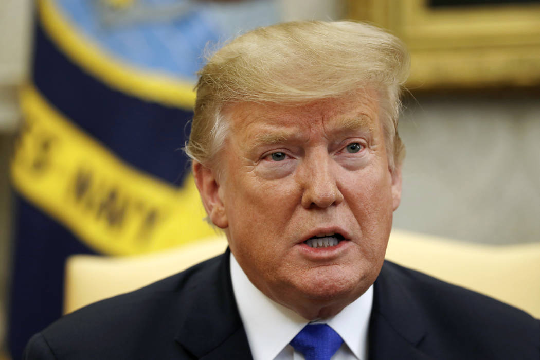 President Donald Trump speaks during a meeting with former U.S. hostage in Yemen, Danny Burch, Wednesday, March 6, 2019, in the Oval Office of the White House in Washington. (AP Photo/Jacquelyn Ma ...