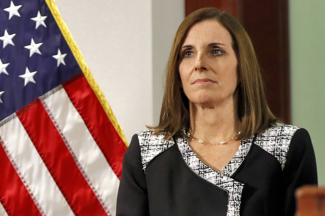 In this Dec. 18, 2018 file photo, then Rep. Martha McSally, R-Ariz., waits to speak during a news conference at the Capitol in Phoenix. Sen. Martha McSally, R-Ariz., the first female fighter pilot ...