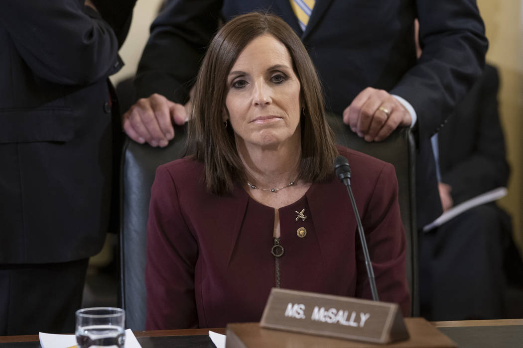 Before a hearing by the Senate Armed Services Subcommittee on Personnel about prevention and response to sexual assault in the military, Sen. Martha McSally, R-Ariz., prepares to recount her own e ...