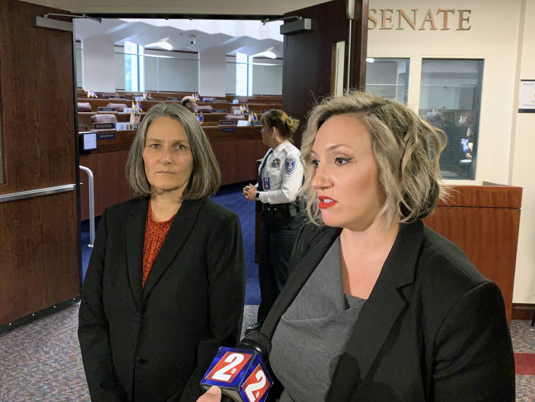 State Sen. Nicole Cannizzaro, right, the new Democratic Senate majority leader, speaks to reporters outside the Senate chamber in Carson City on Wednesday, March 6, 2019, about changes in caucus l ...