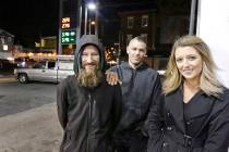 In this Nov. 17, 2017 file photo, Johnny Bobbitt Jr., left, Kate McClure, right, and McClure's boyfriend Mark D'Amico pose at a Citgo station in Philadelphia. (Elizabeth Robertson/The Philadelphia ...