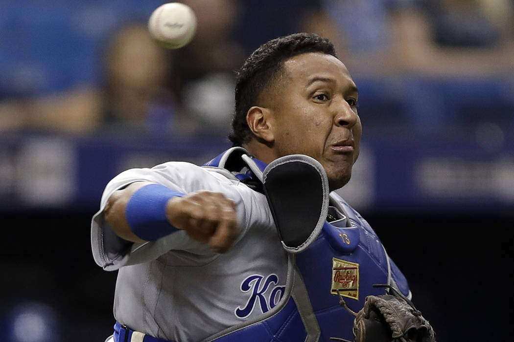 Kansas City Royals catcher Salvador Perez throws out Tampa Bay Rays' Kevin Kiermaier at first on a slowly rolling ground ball during the fifth inning of a baseball game in St. Petersburg, Fla. on ...