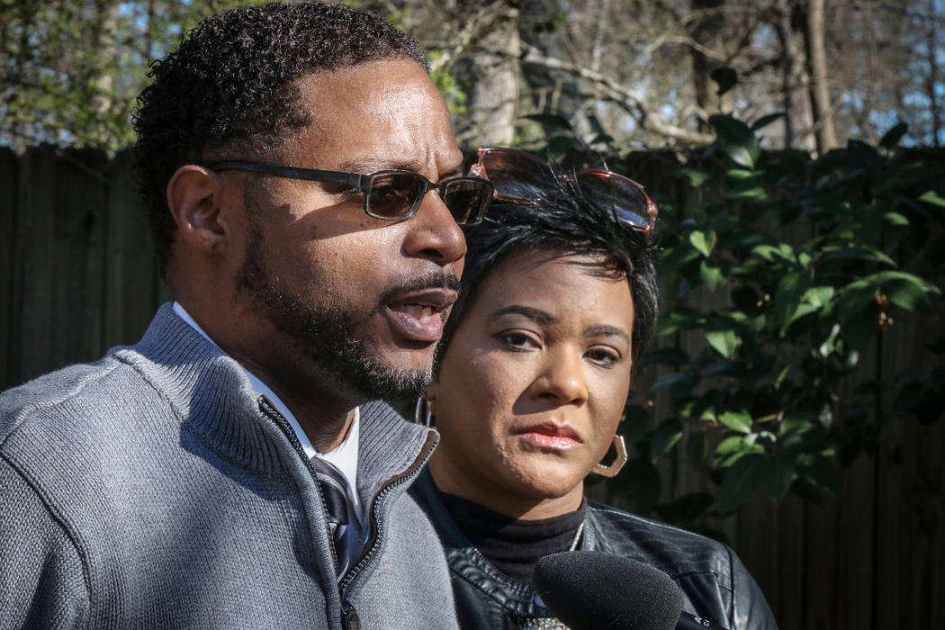 Timothy Savage, left, and his wife Jonjelyn Savage discuss their daughter's relationship with R&B singer R. Kelly at a press conference with their attorney on Wednesday, March 6, 2019, in Deca ...