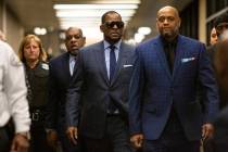 Musician R. Kelly arrives at the Daley Center for a hearing in his child support case at the Daley Center, Wednesday, March 6, 2019, in Chicago. Kelly was charged last month with sexually abusing ...
