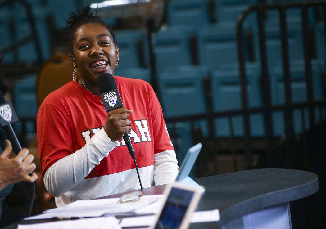 Former Liberty basketball player Dre'Una Edwards, who now plays for Utah, is interviewed on the Pac-12 Network before her team plays Washington in the Pac-12 women's basketball tournament at the M ...