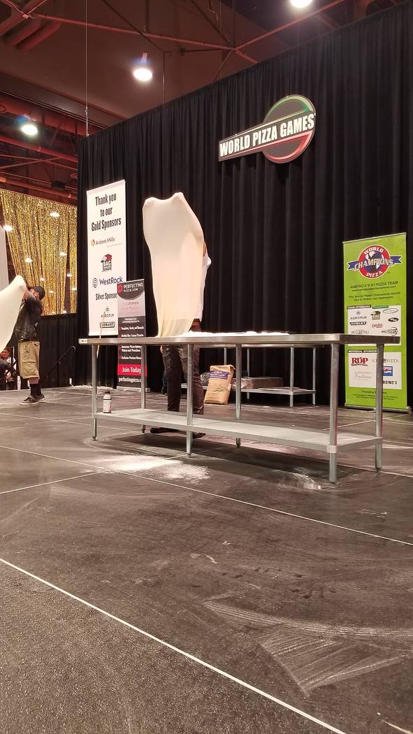 Competition in the Largest Stretch contest at the International Pizza Expo on Wednesday, March 6, 2019, at the Las Vegas Convention Center. Heidi Knapp Rinella/Las Vegas Review-Journal