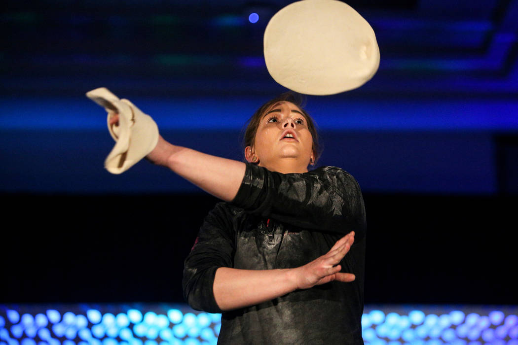 Tara Hattan competes in the dough-tossing championship of the International Pizza Expo at the Las Vegas Convention Center in Las Vegas, Wednesday, March 6, 2019. (Caroline Brehman/Las Vegas Review ...