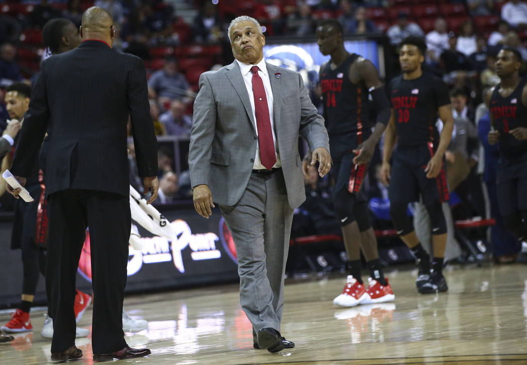 UNLV Rebels head coach Marvin Menzies reacts during the second half of a quarterfinal game against San Diego State in the Mountain West men's basketball tournament at the Thomas & Mack Center ...