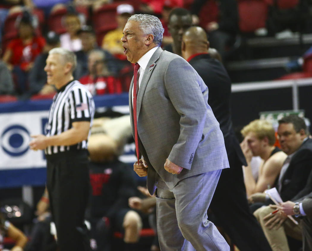 UNLV Rebels head coach Marvin Menzies reacts during the first half of a quarterfinal game against San Diego State in the Mountain West men's basketball tournament at the Thomas & Mack Center i ...