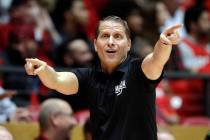 UNR head coach Eric Musselman gives instructions to his players from the sideline during the second half of an NCAA college basketball game against New Mexico in Albuquerque, N.M., Saturday, Jan. ...
