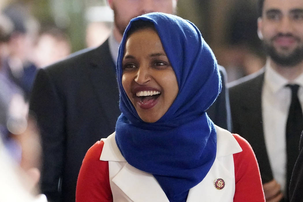 In this Feb. 5, 2019 photo, Rep. Ilhan Omar, D-Minn., arrives for President Donald Trump's State of the Union address to a joint session of Congress on Capitol Hill in Washington. Omar’s la ...