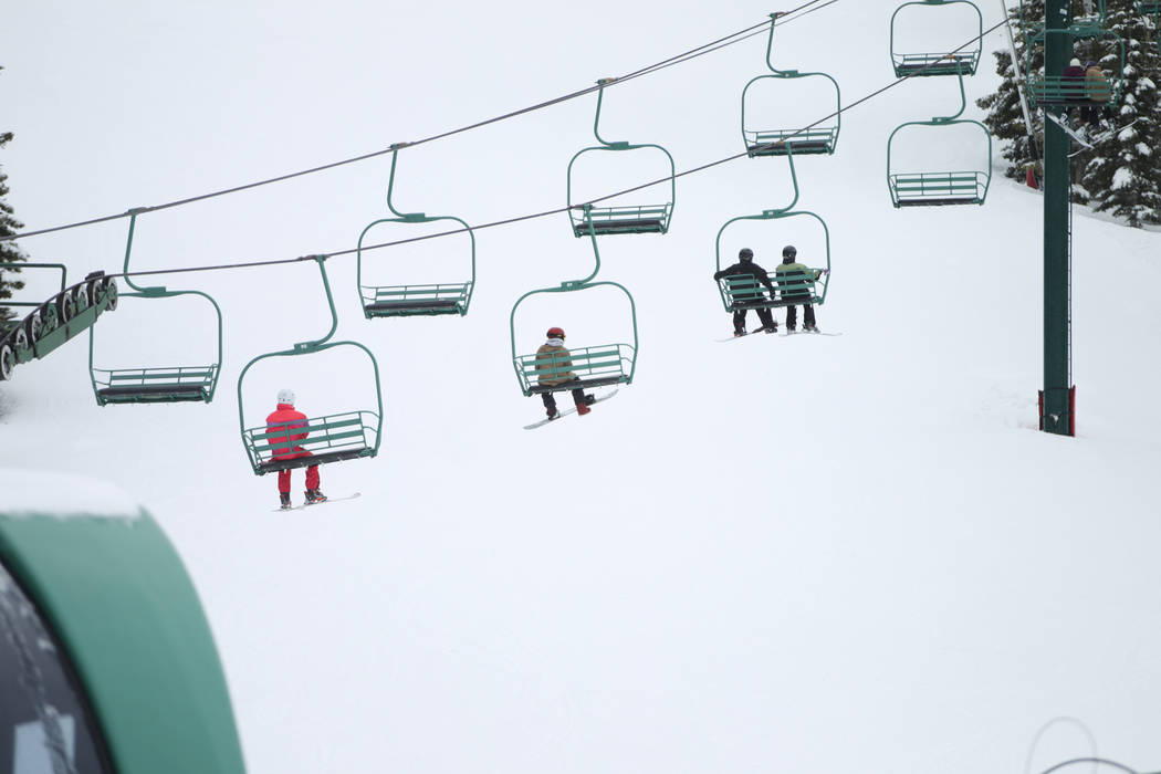 People ride a lift up the hill at Lee Canyon in Las Vegas, Friday, March 8, 2019. Erik Verduzco Las Vegas Review-Journal @Erik_Verduzco