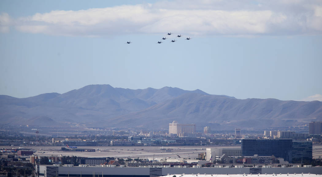 The U.S. Navy Blue Angels fly over the Hard Rock Hotel and McCarran International Airport in Las Vegas Friday, March 8, 2019. (K.M. Cannon/Las Vegas Review-Journal) @KMCannonPhoto
