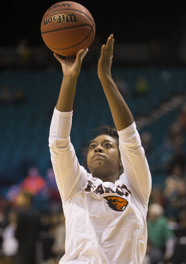Oregon State junior guard Madison Washington (3), a Las Vegas native and Bishop Gorman graduate, warms up before the start of the Beavers Pac 12 Tournament game with the Washington Huskies on Frid ...