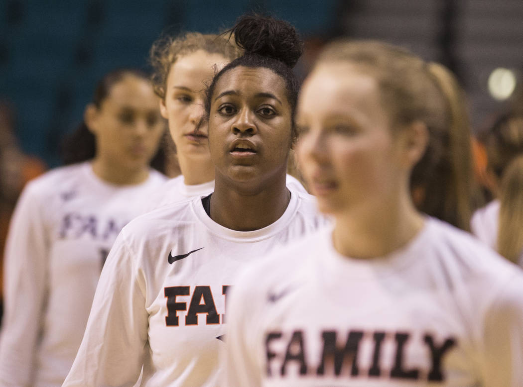 Oregon State junior guard Madison Washington, middle, a Las Vegas native and Bishop Gorman graduate, warms up before the start of the Beavers Pac 12 Tournament game with the Washington Huskies on ...
