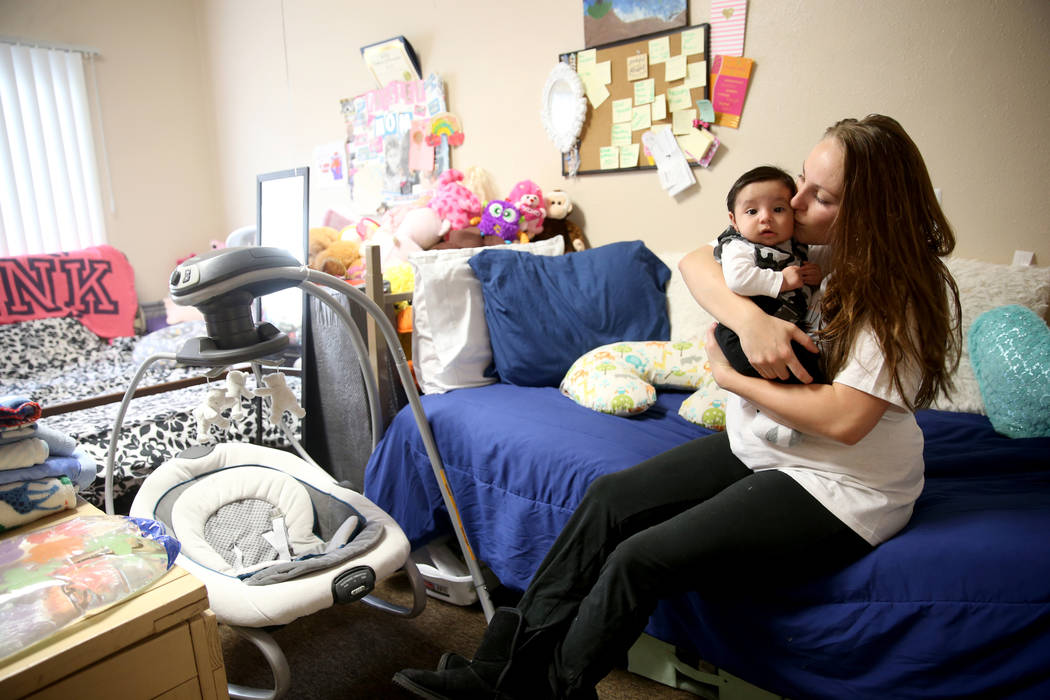Cynthia Constanzo with her 3-month-old son, Isaiah, in her bedroom in the new transitional housing area, named the "Second Chance Wing," at WestCare Nevada Women and Children's Campus in ...