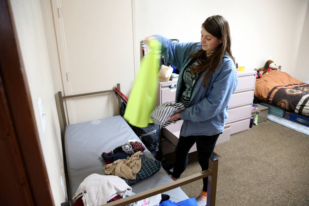 Laurie, who is 34 weeks pregnant, moves into her bedroom in the new transitional housing area, named the "Second Chance Wing," at WestCare Nevada Women and Children's Campus in Las Vegas, Wednesda ...