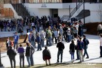 People line up to participate in the Democratic caucus at the University of Nevada in Reno, Feb. 20, 2016. Nevada Democrats are proposing major changes to their presidential caucuses that could d ...