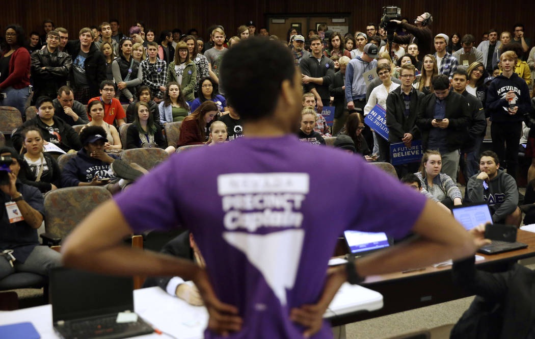 A precinct captain argues his position during a Democratic caucus at the University of Nevada in Reno, Feb. 20, 2016. Nevada Democrats are proposing major changes to their presidential caucuses th ...