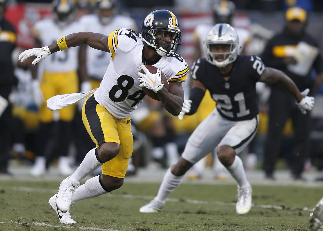 Pittsburgh Steelers wide receiver Antonio Brown (84) runs against Oakland Raiders cornerback Gareon Conley (21) during the first half of an NFL football game in Oakland, Calif., Sunday, Dec. 9, 20 ...
