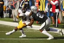 Pittsburgh Steelers wide receiver Antonio Brown (84) runs against Oakland Raiders cornerback Gareon Conley (21) during the first half of an NFL football game in Oakland, Calif., Sunday, Dec. 9, 20 ...
