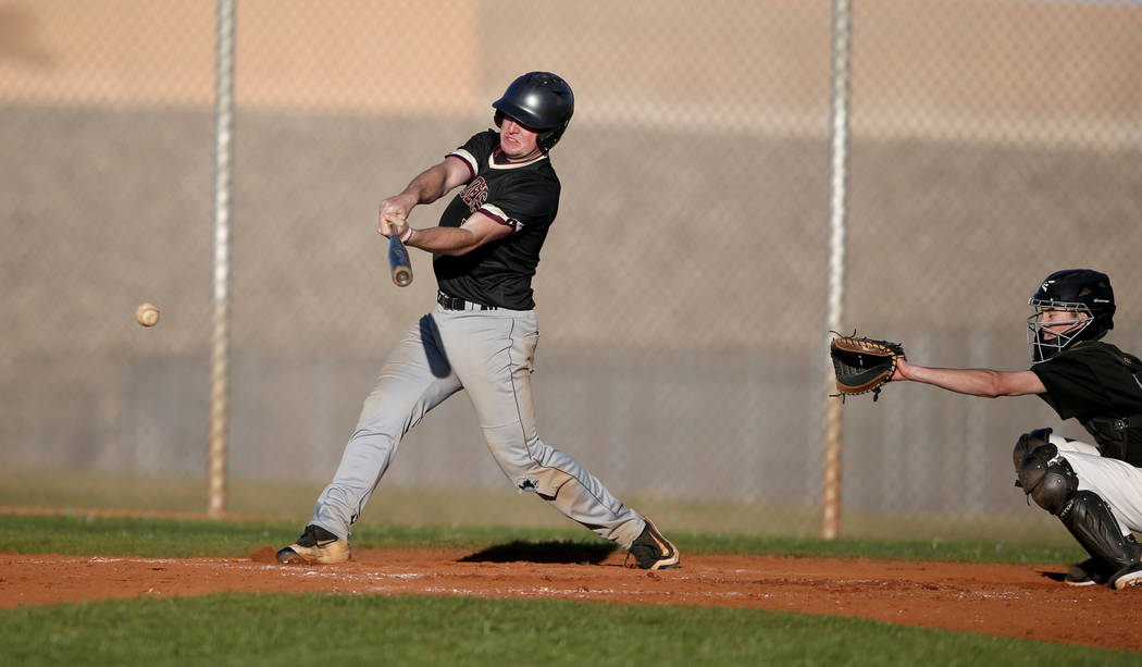 Faith Lutheran Jacob Ortega (8) gets a base hit against Silverado during a baseball game at Silverado High School in Las Vegas Friday, March 8, 2019. (K.M. Cannon/Las Vegas Review-Journal) @KMCann ...