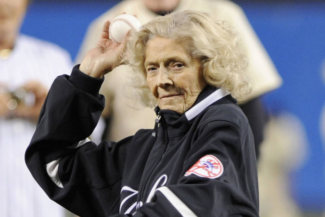 Julia Ruth Stevens, the daughter of former New York Yankee Babe Ruth, throws a pitch to Yankees catcher Jorge Posada during ceremonies at Yankee Stadium in New York on Sunday, Sept. 21, 2008. (AP ...