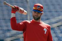 Philadelphia Phillies' Bryce Harper waits his turn in the batting cage before a spring training baseball game against the Toronto Blue Jays Saturday, March 9, 2019, in Clearwater, Fla. (AP Photo/C ...