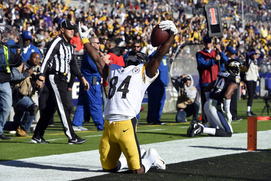 Pittsburgh Steelers wide receiver Antonio Brown celebrates after scoring a touchdown in the first half of an NFL football game against the Baltimore Ravens, Sunday, Nov. 4, 2018, in Baltimore. (AP ...