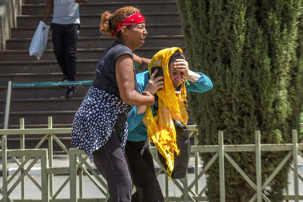 Family members of the victims involved in a plane crash react at Addis Ababa international airport Sunday, March 10, 2019. An Ethiopian Airlines flight crashed shortly after takeoff from Ethiopia' ...