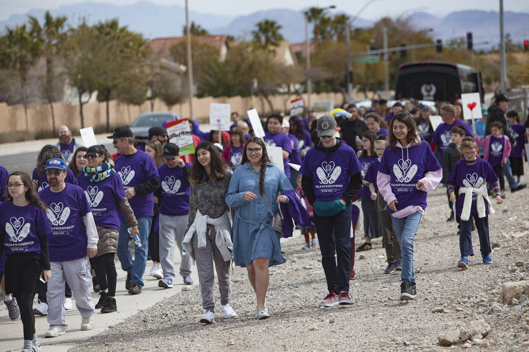 A crowd walks from Bet Yossef Community Center to Las Vegas Sports Park as part of Friendship Circle's Walk4Friendship Las Vegas event in Las Vegas, Sunday, March 10, 2019. Fri ...