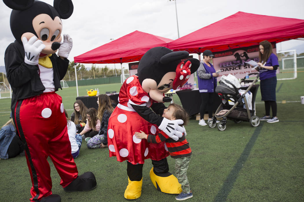 Minnie Mouse hugs Barack Sharaby, 2, during Friendship Circle's Walk4Friendship Las Vegas event, Sunday, March 10, 2019, at Las Vegas Sports Park. Friendship Circle is a nonsectaria ...