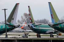 Boeing 737 MAX 8 planes are parked near Boeing Co.'s 737 assembly facility in Renton, Wash. (AP Photo/Ted S. Warren, File)
