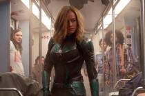 Brie Larson stars in a scene from "Captain Marvel." (Disney-Marvel Studios via AP)
