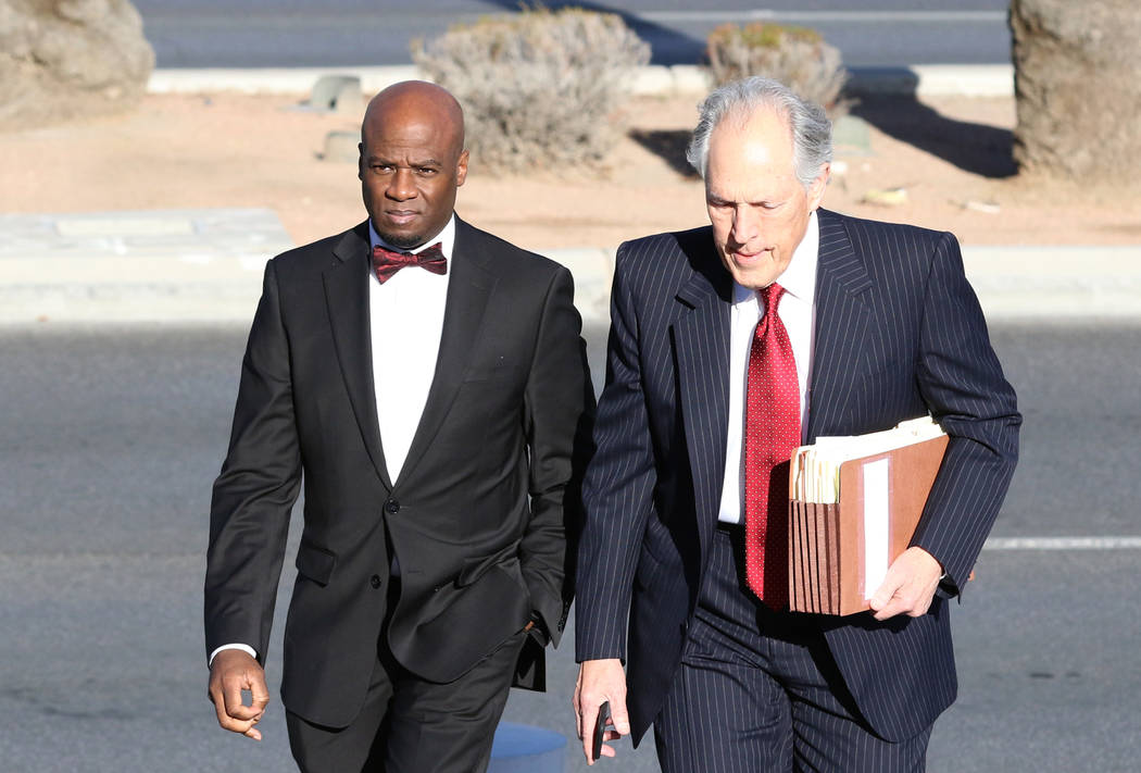 Former Nevada Senate majority leader Kelvin Atkinson, left, and his attorney Richard Wright arrive at the Lloyd George U.S. Courthouse on Monday, March. 11, 2019, in Las Vegas. Bizuayehu Tesfaye L ...