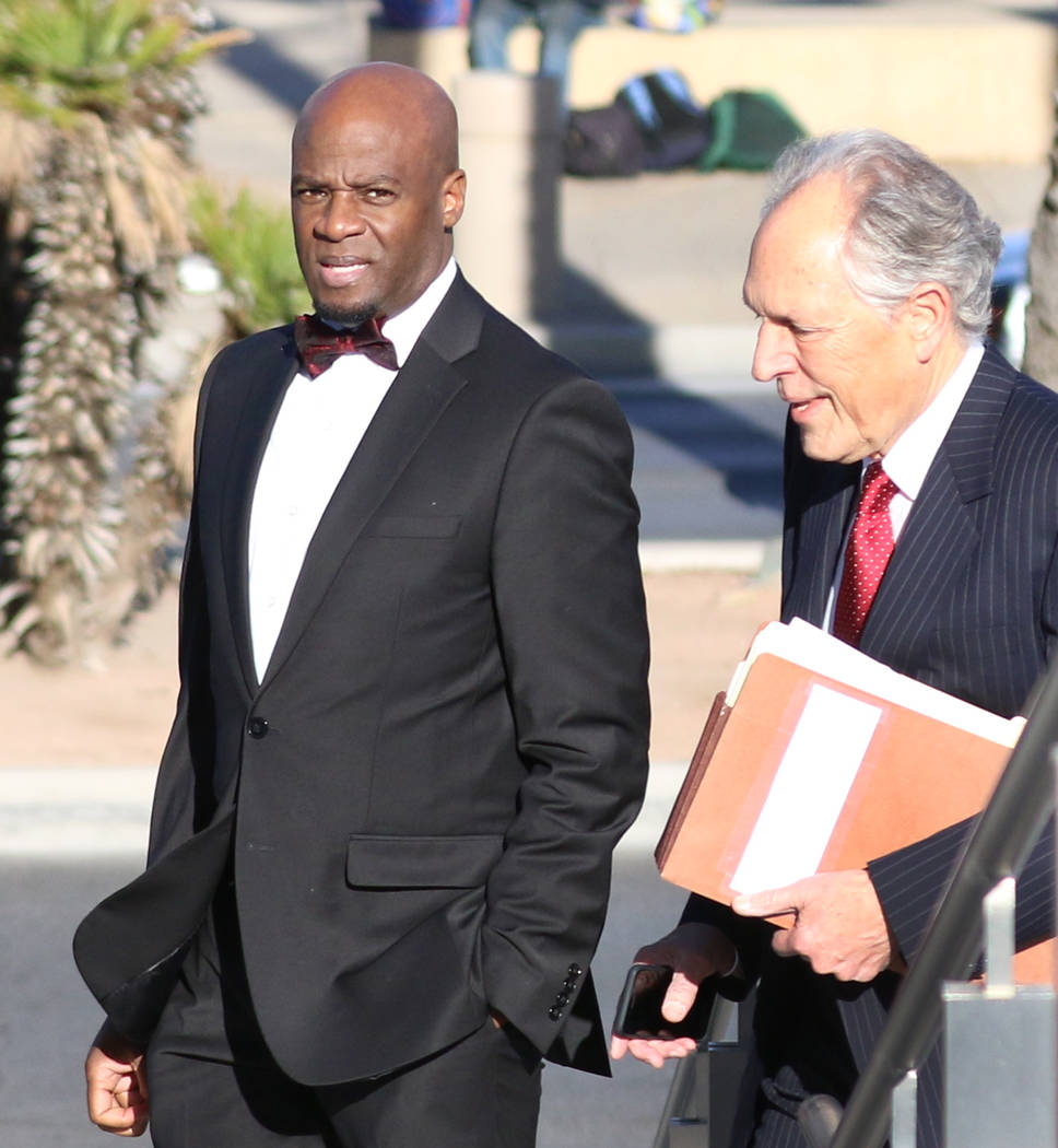 Former Nevada Senate majority leader Kelvin Atkinson, left, and his attorney Richard Wright arrive at the Lloyd George U.S. Courthouse on Monday, March. 11, 2019, in Las Vegas. Bizuayehu Tesfaye L ...